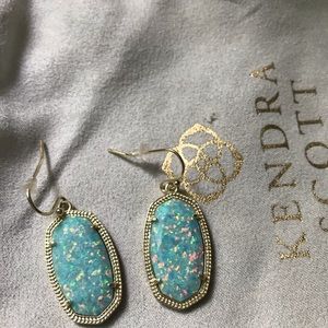 Kendra Scott earrings.
